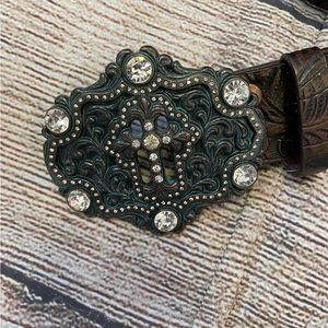 Chocolate brown leather belt with a cross pendant on front with rhinestones SZ M